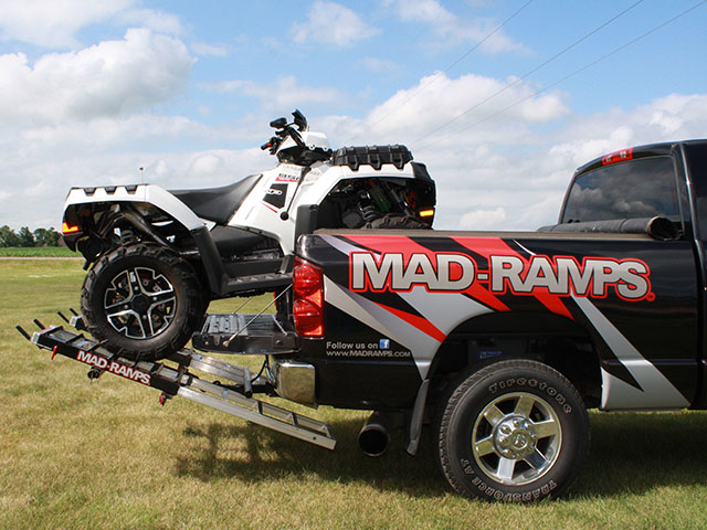 A new foldable ramp creates room in the bed of a pickup for both an ATV and storage space near the cab. (Photo courtesy: MAD-RAMPS)